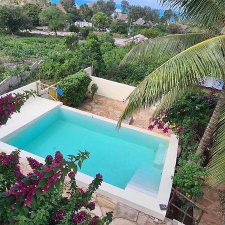 Maisha Marefu Apartments كيوينجوا المظهر الخارجي الصورة