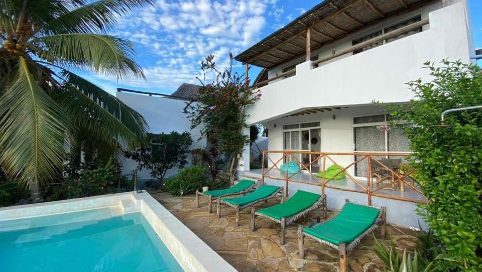 Maisha Marefu Apartments كيوينجوا المظهر الخارجي الصورة